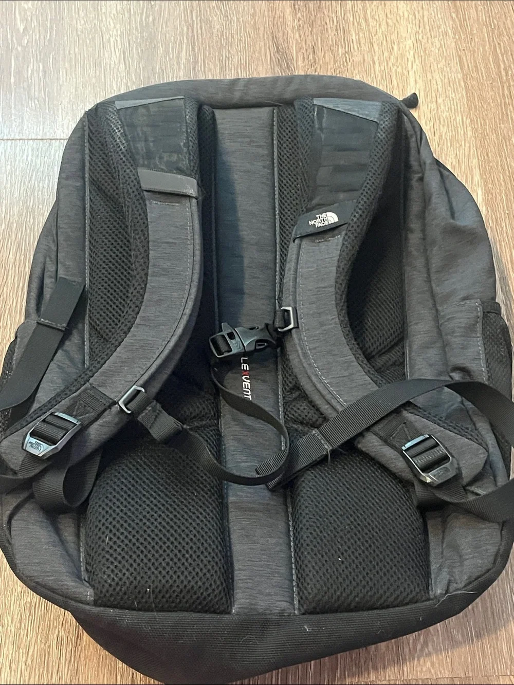 The NorthFace Jester Black Backpack with Light Pink Bungee Cord